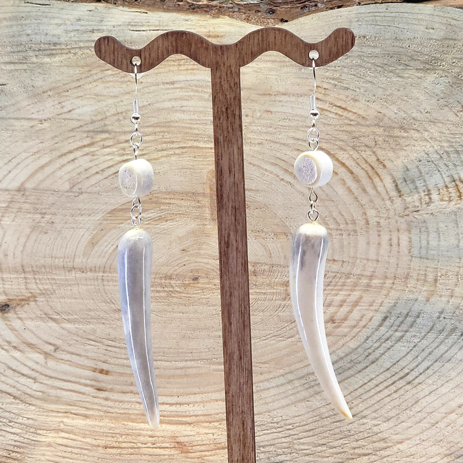 Pair of antler earrings with polished tips and antler beads made in Montana, USA by 406 Antlery