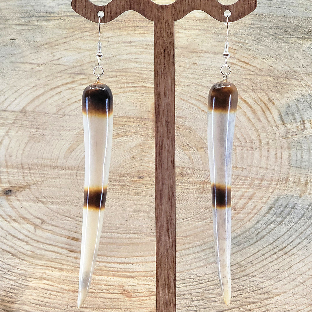 Pair of natural antler earrings with designed tips from 406 Antlery
