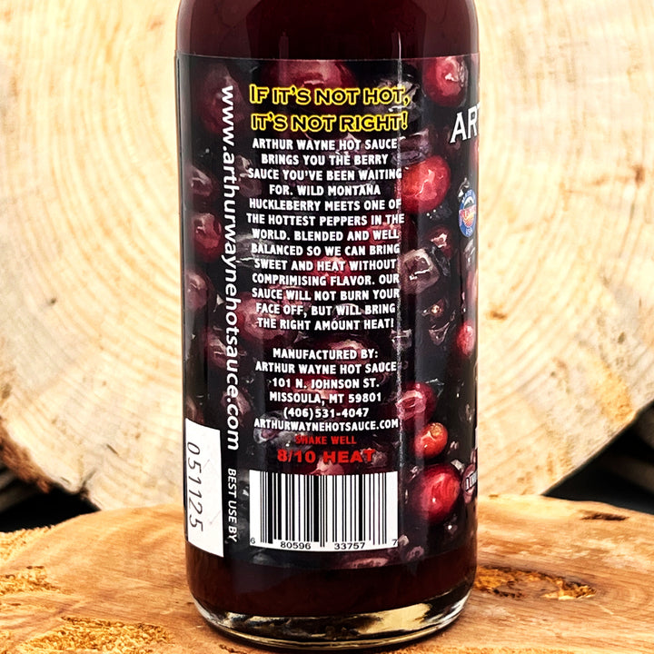 5 oz. Bottle of Huckleberry Ghost Hot Sauce, with Huckleberry, Ghost Pepper, and Pineapple, made in Montana by Arthur Wayne Hot Sauce
