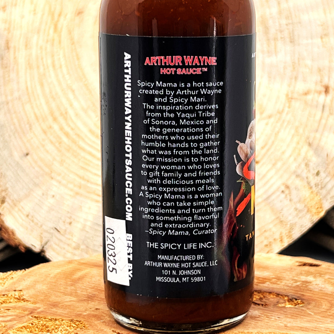 5 oz. bottle of Spicy Mama Hot Sauce, with Peppers (Habanero, Fresno), Tomato, Mango, Tamarind Concentrate, Cocoa, Lemon Juice, and spices made in Montana by Arthur Wayne Hot Sauce
