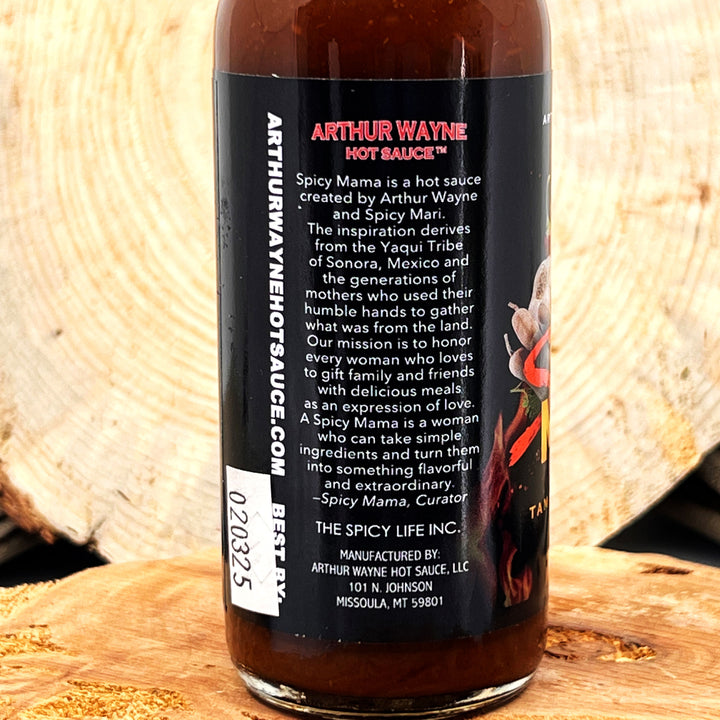 5 oz. bottle of Spicy Mama Hot Sauce, with Peppers (Habanero, Fresno), Tomato, Mango, Tamarind Concentrate, Cocoa, Lemon Juice, and spices made in Montana by Arthur Wayne Hot Sauce