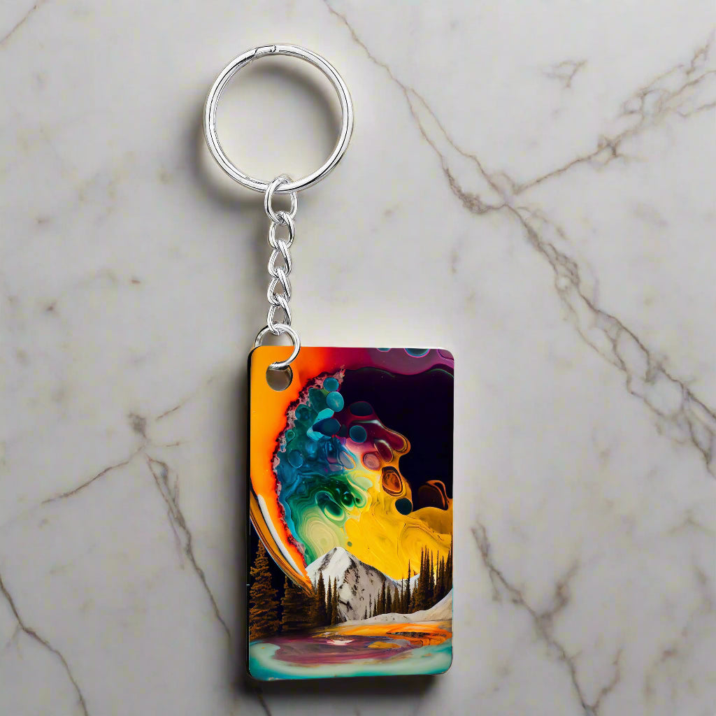 Acrylic and metal keychain with the Agate Ink Sky Rectangle design made and printed in Montana, USA by Blue Peak Creative.