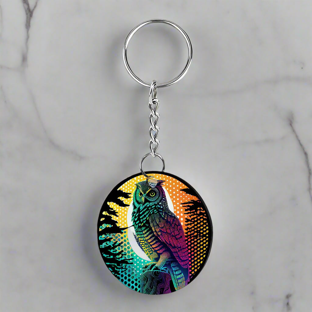 Acrylic and metal keychain with the Pastel Owl Circle design made and printed in Montana, USA by Blue Peak Creative.
