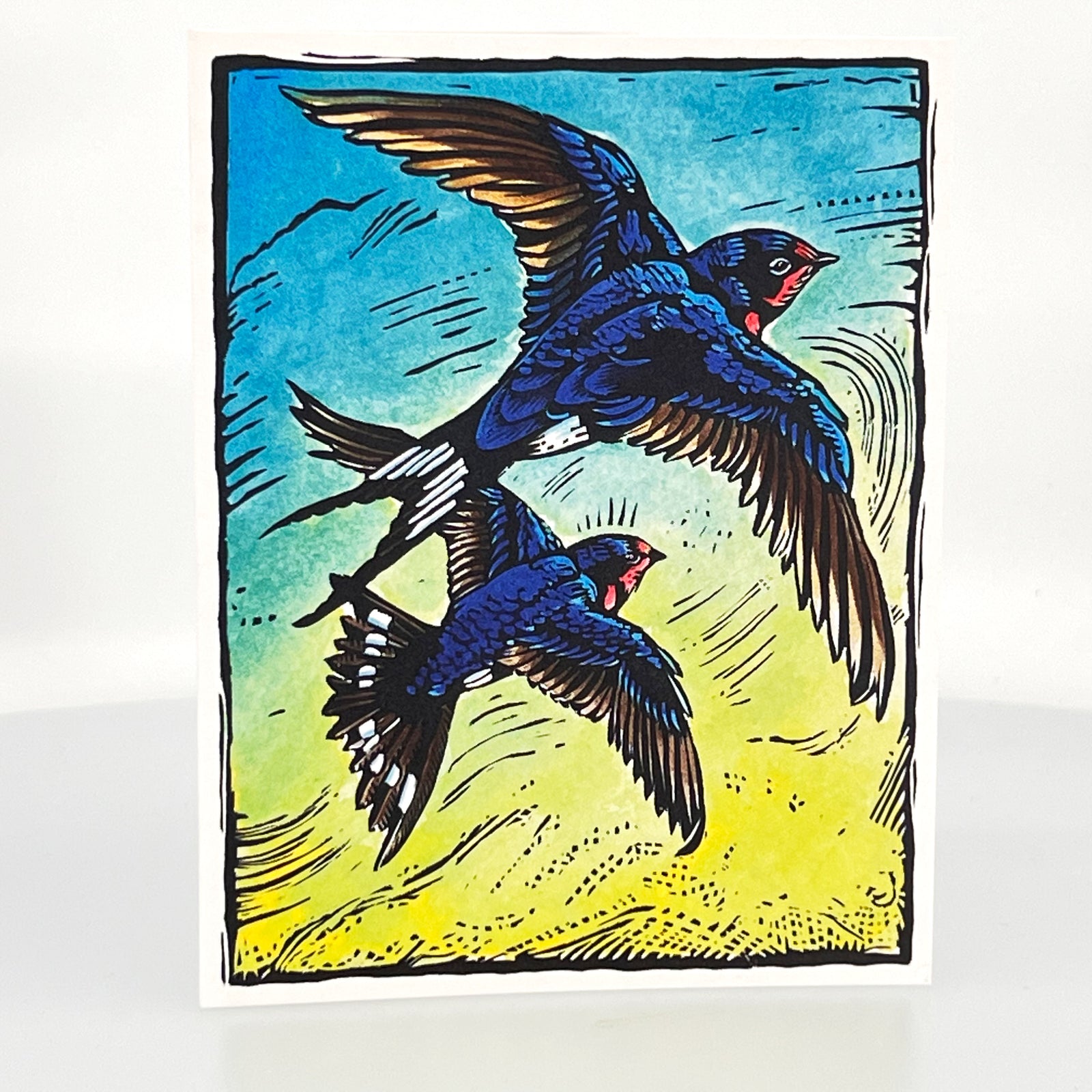 Barn Swallows: Slicing Through the Air Greeting Card--a reproduction of one of Claire Emery’s original woodcut prints, made in Montana, USA