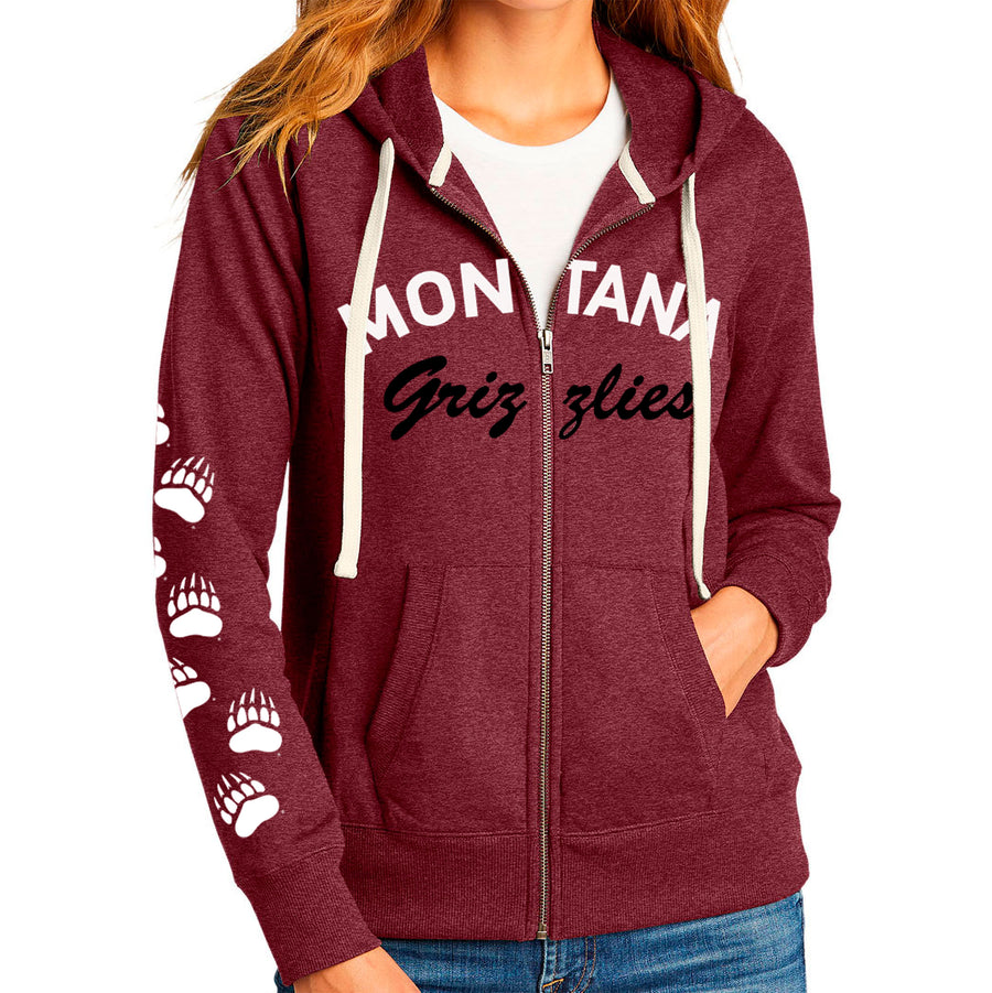 Blue Peak Creative's maroon Ladies' Flock Zip-up Hoodie with the Montana Grizzlies design on front with white paws on sleeve