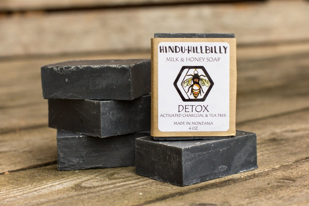 4 oz. bar of Hindu Hillbilly Detox Activated Charcoal & Tea Tree Milk & Honey Soap, front