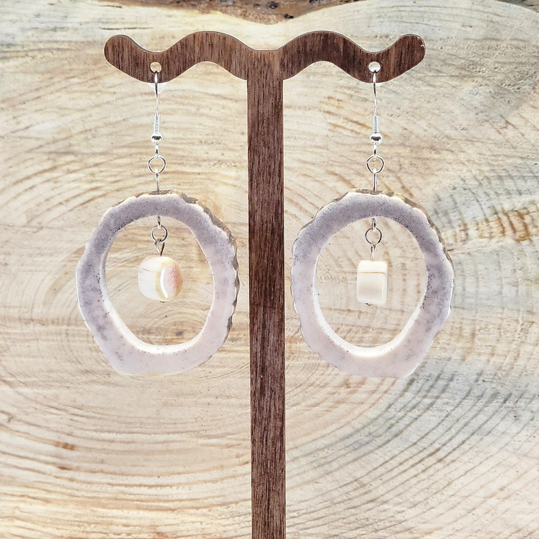 Pair of natural antler hoop earrings with antler beads suspended in the middle, from 406 Antlery