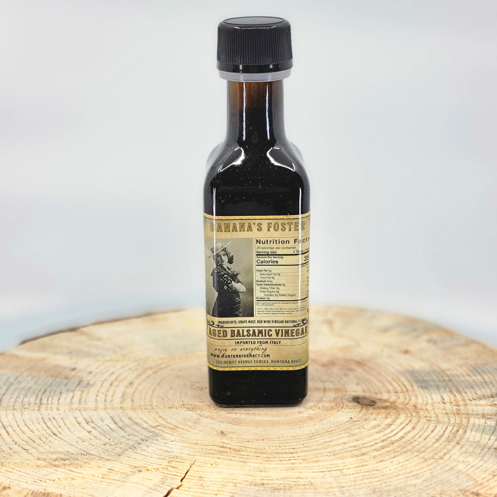 100 ml bottle of Banana's Foster Aged Balsamic Vinegar, made in Montana by Montana Pharmacy