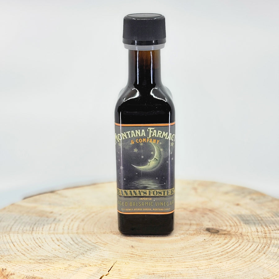 100 ml bottle of Banana's Foster Aged Balsamic Vinegar, made in Montana by Montana Pharmacy