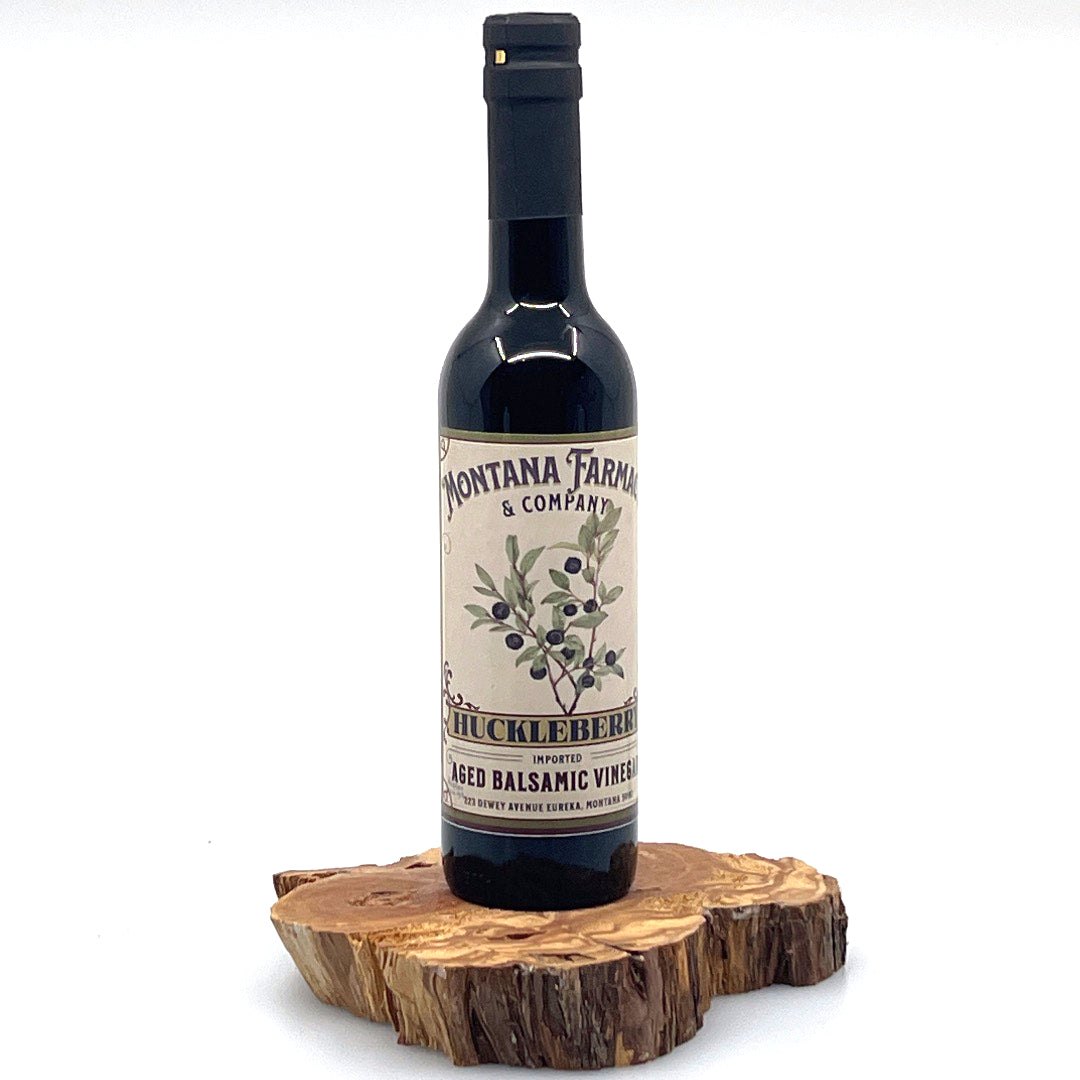 375 ml bottle of Montana Huckleberry Dark Aged Balsamic Vinegar, made in Montana by Montana Pharmacy