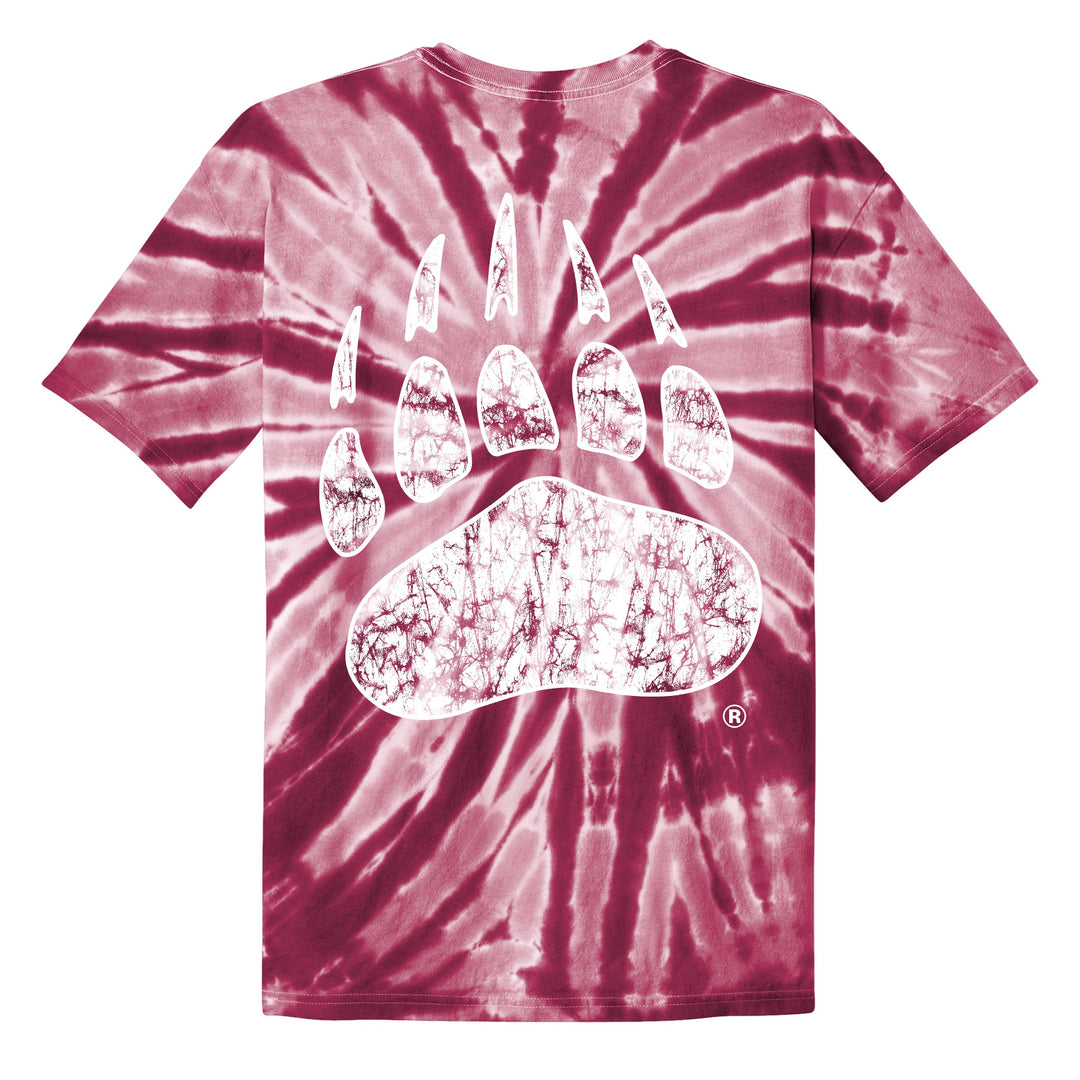 The back of a maroon tie dye t-shirt, showing the print of a white University of Montana Griz Paw logo