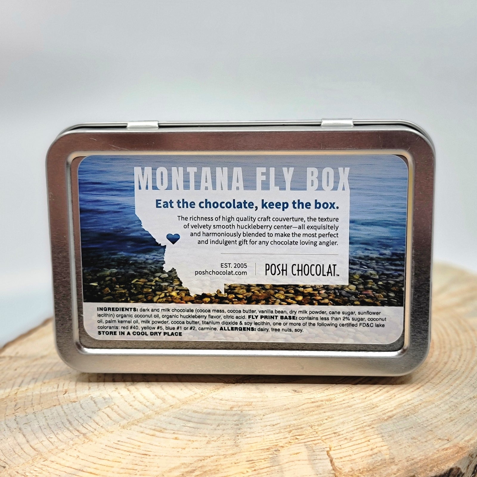 Posh Chocolat's Montana Fly Box - Dark Chocolate Huckleberry Bonbons, a metal tin with 12 artisanal chocolates made in Missoula, Montana