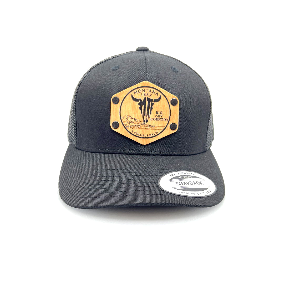 Black Trucker Hat with All Wood Patch Centennial Coin