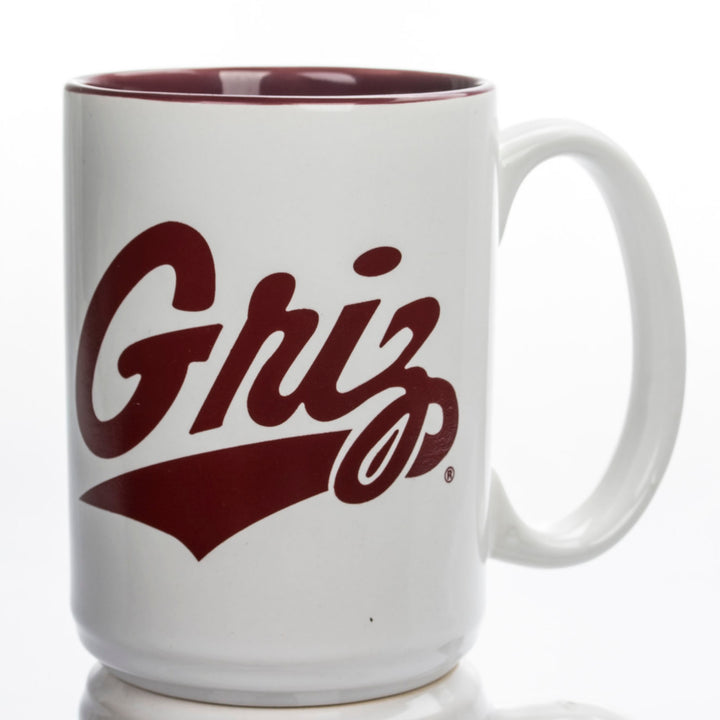 Blue Peaks Creative's white Coffee Mug with maroon interior, with the Griz Script and Paw in maroon, side 2