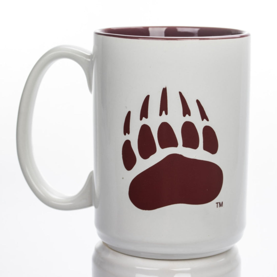 Blue Peaks Creative's white Coffee Mug with maroon interior, with the Griz Script and Paw in maroon, side
